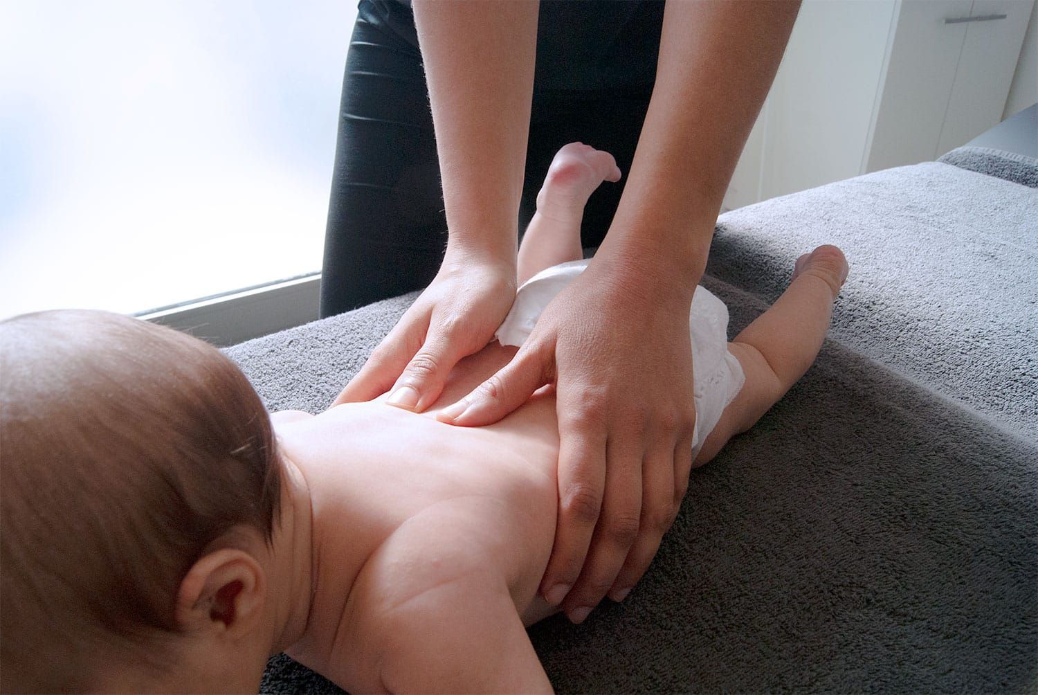 Gentle treatment on a baby's back